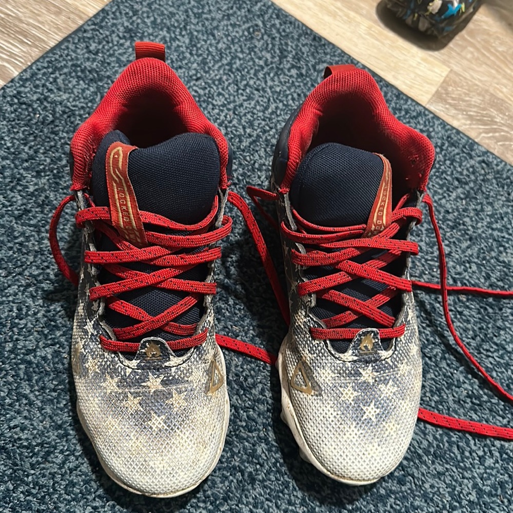 Boys under armour cleats size 3.5